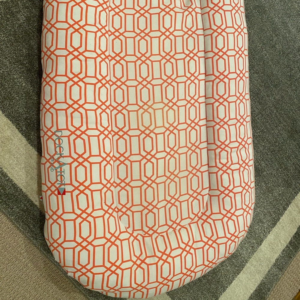 Dockatot Grand with two covers